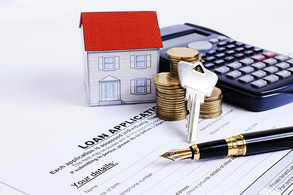 https://tower.10bestmortgage.com/wp-content/uploads/2023/06/Fountain-pen-and-key-and-calculator-and-paper-house-and-coins-stack-on-Loan-Application-form-for-Mortgage-loans-concept.jpg