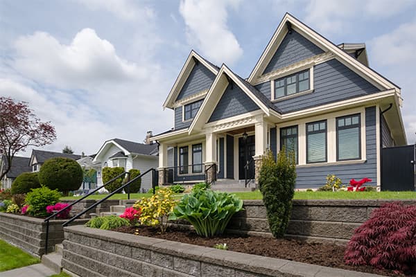 Luxury-residential-house-with-front-yard-over-land-terraces.